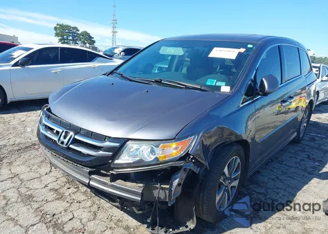 2016 Honda Odyssey Touring/Touring Elite z USA, uszkodzony, nr VIN 5FNRL5H98GB098883